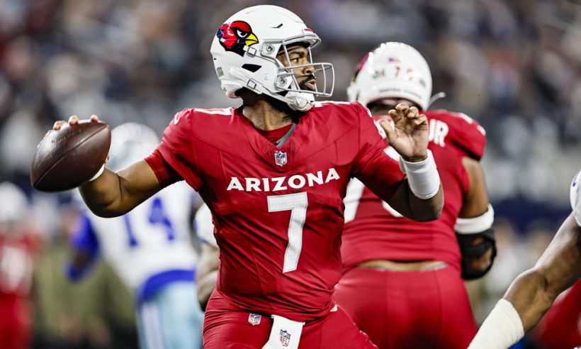 Arizona Cardinals quarterback Jacoby Brissett (7) looks for an open receiver during the game between the Dallas Cowboys and the Arizona Cardinals on November 03, 2025 at AT&T Stadium in Arlington, Texas.