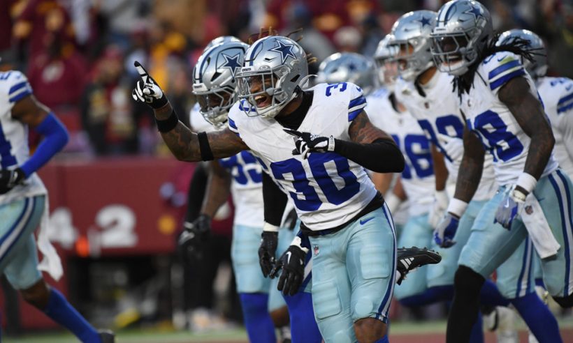 Cowboys safety Juanyeh Thomas (30) celebrates after returning an onside kick 43 yards for a touchdown late in the fourth quarter during the Dallas Cowboys versus Washington Commanders National Football League game at Northwest Stadium on November 24, 2024 in Landover, MD.