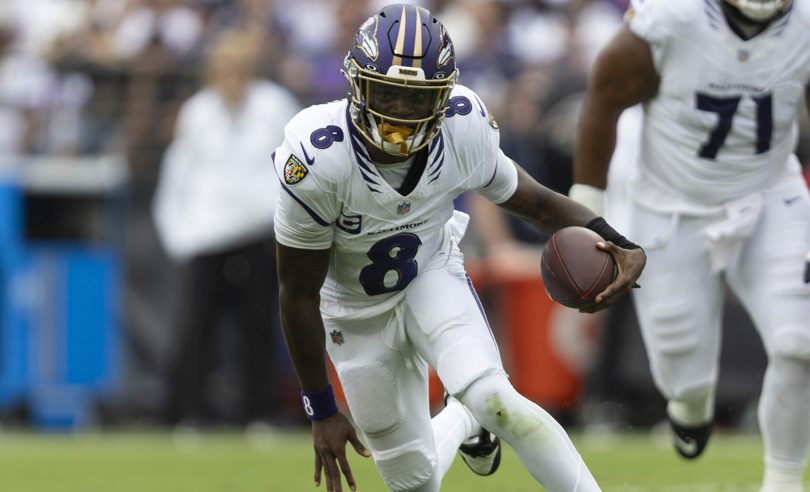 BALTIMORE, MD - SEPTEMBER 20: Baltimore Ravens quarterback Lamar Jackson (8) scrambles for a first down during a NFL football game between New Orleans Saints and Baltimore Ravens September 20, 2026 at M&T Bank Stadium in Baltimore, MD (Photo by Charles Brock/Icon Sportswire)