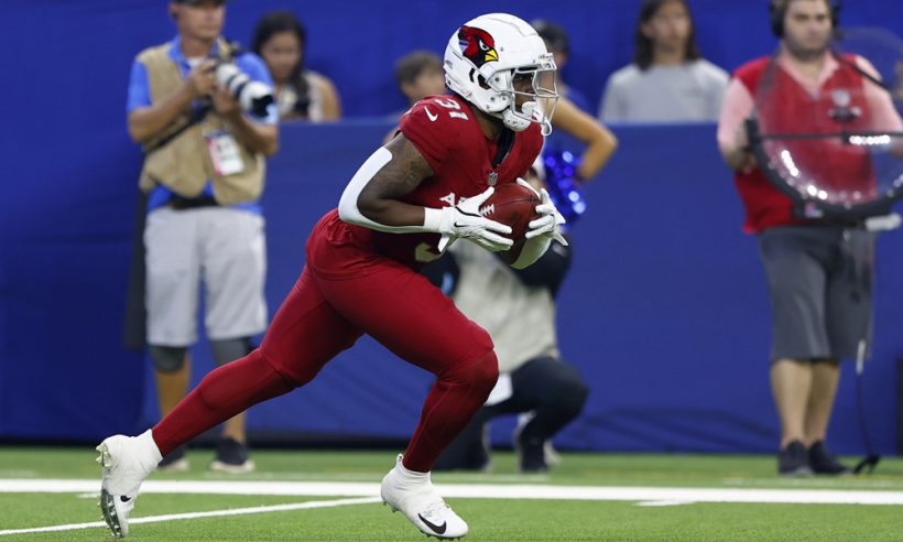 Arizona Cardinals running back Emari Demercado (31) runs up field during the NFL Preseason game between the Arizona Cardinals and the Indianapolis Colts on August 17, 2024 at Lucas Oil Stadium in Indianapolis, IN.