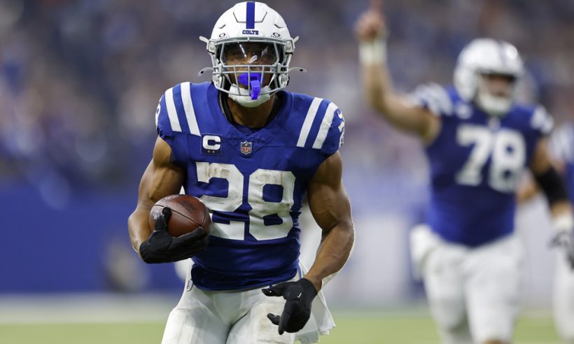 Indianapolis Colts running back Jonathan Taylor (28) take is in from 29 yards for the touchdown during and NFL game between the Chicago Bears and the Indianapolis Colts on September 22, 2024 at Lucas Oil Stadium in Indianapolis, IN.