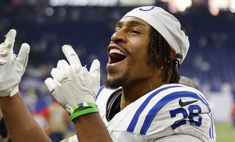 Indianapolis Colts running back Jonathan Taylor (28) celebrates as he runs off the field after a NFL game between the Tennessee Titans and the Indianapolis Colts on December 22, 2024 at Lucas Oil Stadium in Indianapolis, IN.