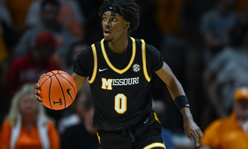 Missouri Tigers guard Anthony Robinson II (0) brings the ball up court during the college basketball game between the Tennessee Volunteers and the Missouri Tigers on February 5, 2025, at Food City Center in Knoxville, TN.