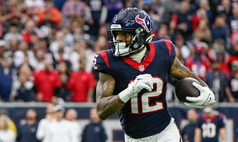 Houston Texans wide receiver Nico Collins (12) attempts to get to the edge during the AFC Wild Card game between the Cleveland Browns and Houston Texans at NRG Stadium on January 13, 2024 in Houston, Texas.