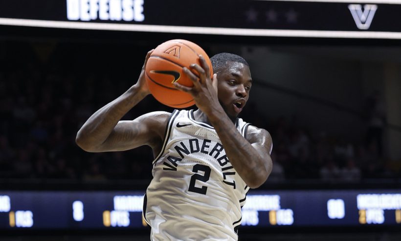 NASHVILLE, TN - JANUARY 07: Vanderbilt Commodores guard Duke Miles (2) grabs a rebound during a game between the Vanderbilt Commodores and Alabama Crimson Tide, January 7, 2026, at Memorial Gymnasium in Nashville, Tennessee.
