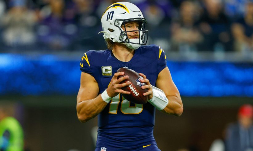 Los Angeles Chargers quarterback Justin Herbert (10) looks to throw the ball during the NFL game between the Baltimore Ravens and the Los Angeles Chargers on November 25, 2024, at SoFi Stadium in Inglewood, CA.