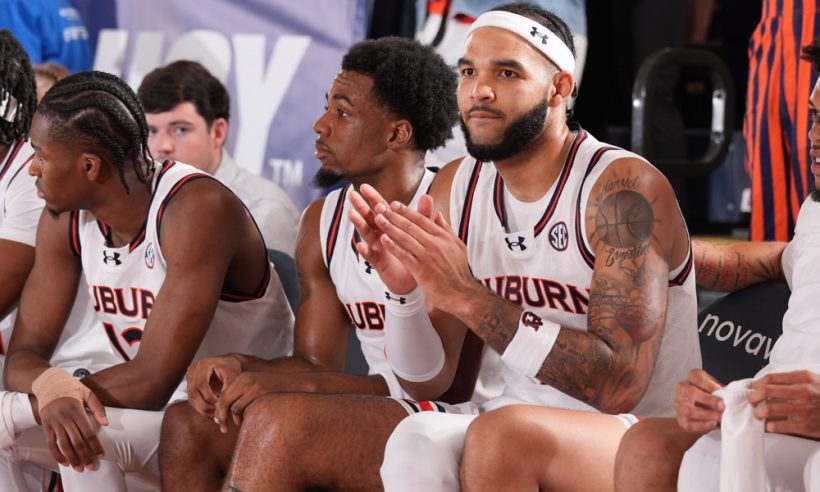 Auburn Tigers forward Johni Broome (4) watches from the bench in a game against the Memphis Tigers in the championship game of the Maui Invitational on November 27, 2024, at the Lahaina Civic Center in Maui, Hawaii.