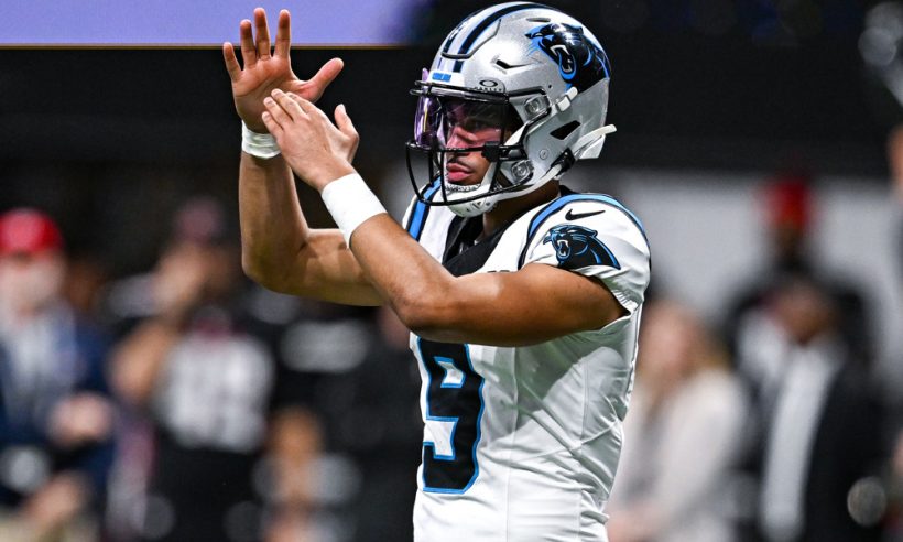Carolina quarterback Bryce Young (9) calls time out during the NFL game between the Carolina Panthers and the Atlanta Falcons on January 5th, 2025 at Mercedes-Benz Stadium in Atlanta, GA.