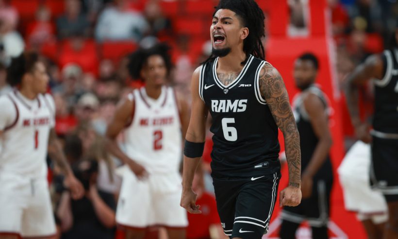 RALEIGH, NC - NOVEMBER 17: Terrence Hill Jr. #6 of the Virginia Commonwealth University Rams reacts to the basket during the college basketball game between the North Carolina State Wolfpack and the Virginia Commonwealth University Rams on November 17, 2025 at the Lenovo Center in Raleigh, NC.