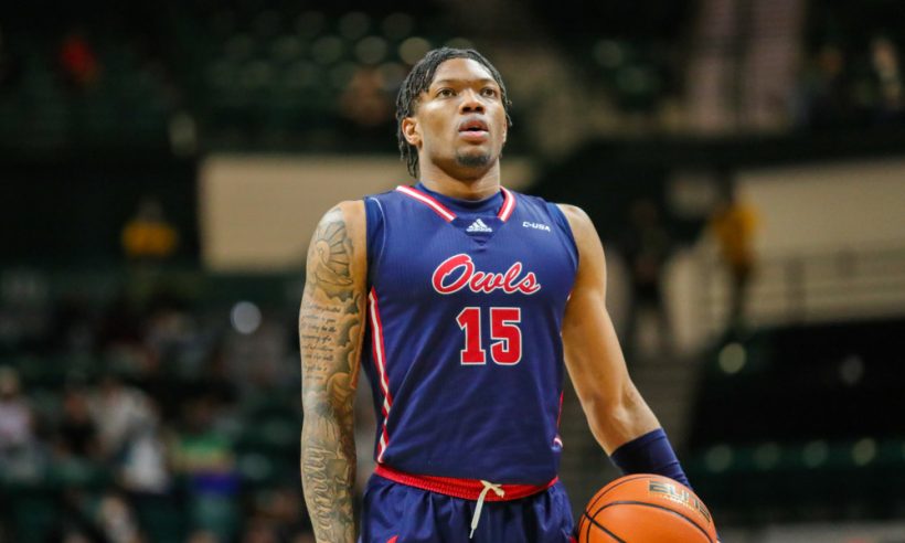 Alijah Martin (15) of the Florida Atlantic Owls takes a deep breath before shooting a free throw during a basketball game between the Charlotte 49ers and the Florida Atlantic Owls on February 26, 2022, at Dale F. Halton Arena in Charlotte, NC.
