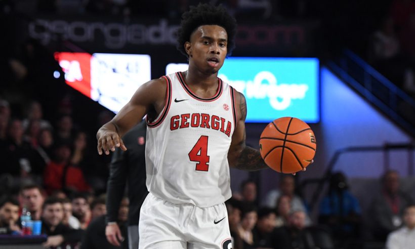 ATHENS, GA - NOVEMBER 14: Guard Marcus Millender #4 of the Georgia Bulldogs looks down court during the college basketball game between the Georgia Tech Yellow Jackets and the Georgia Bulldogs on November 14, 2025, at Stegeman Coliseum in Athens, GA.