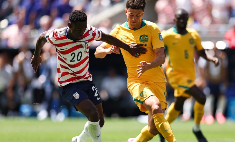 SEATTLE, WA - JUNE 19: Forward Folarin Balogun #20 of the United States is guarded by defender Alessandro Circati #3 of Australia during the FIFA World Cup 2026 Group D match between the USA and Australia on June 19, 2026 at Seattle Stadium in Seattle, Washington. (Photo by Henry Rodenburg/Icon Sportswire)